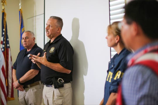 Lincoln County Sheriff Kerry Lee, center, and Director of the Nevada Department of Public Safety James Wright, left, hold a briefing about a Wednesday night bombing that killed one person in Panaca, Nev., on Thursday, July 14, 2016. Lee told the USA Today Network on Thursday, September 12, 2019 that he was unsure of what to expect at the "Alienstock" festival planned for Rachel later this month, but that his team will be ready.